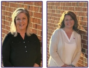 Karen Rose and Amanda Hensley against a brick wall backdrop